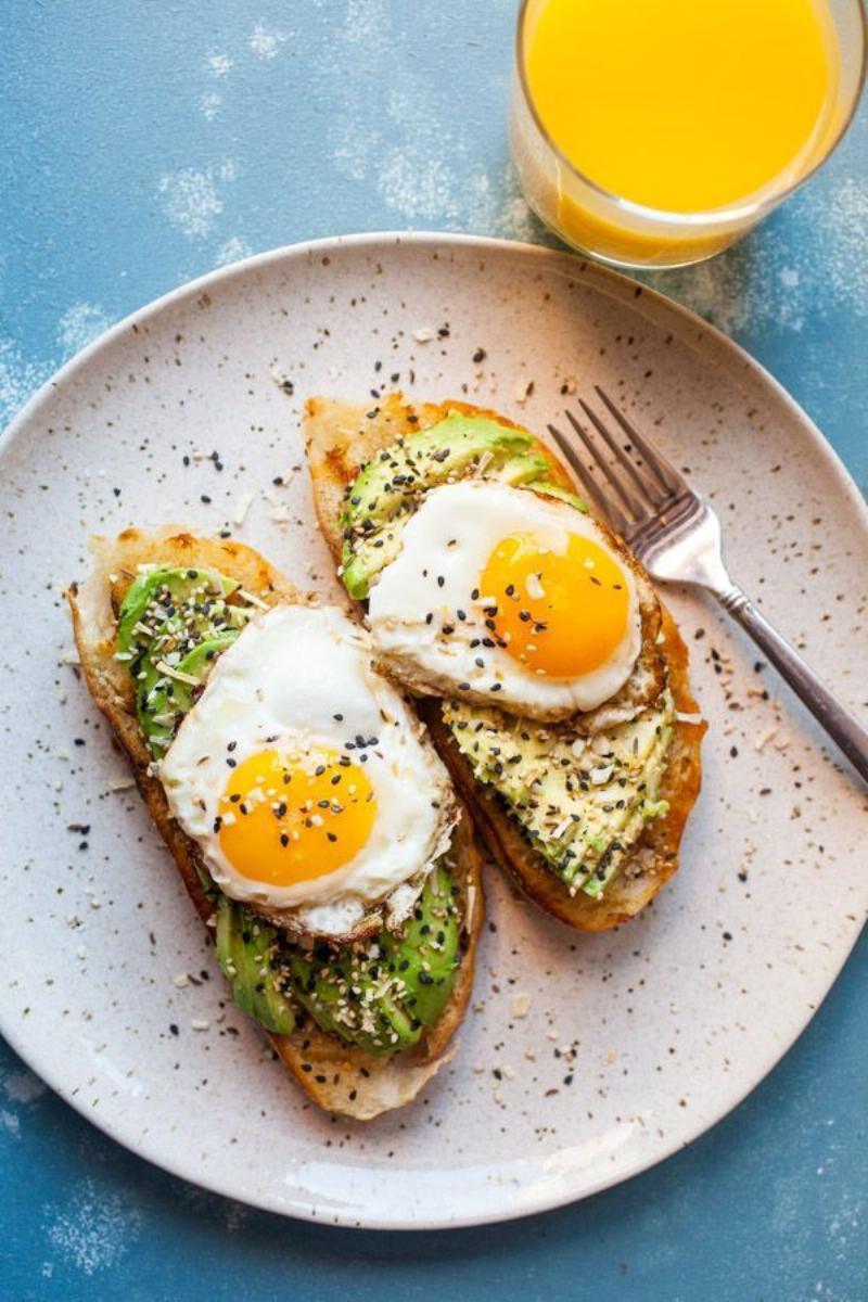 Avocado Toast with a Fried Egg and Everything Bagel Seasoning on Toasted Bread