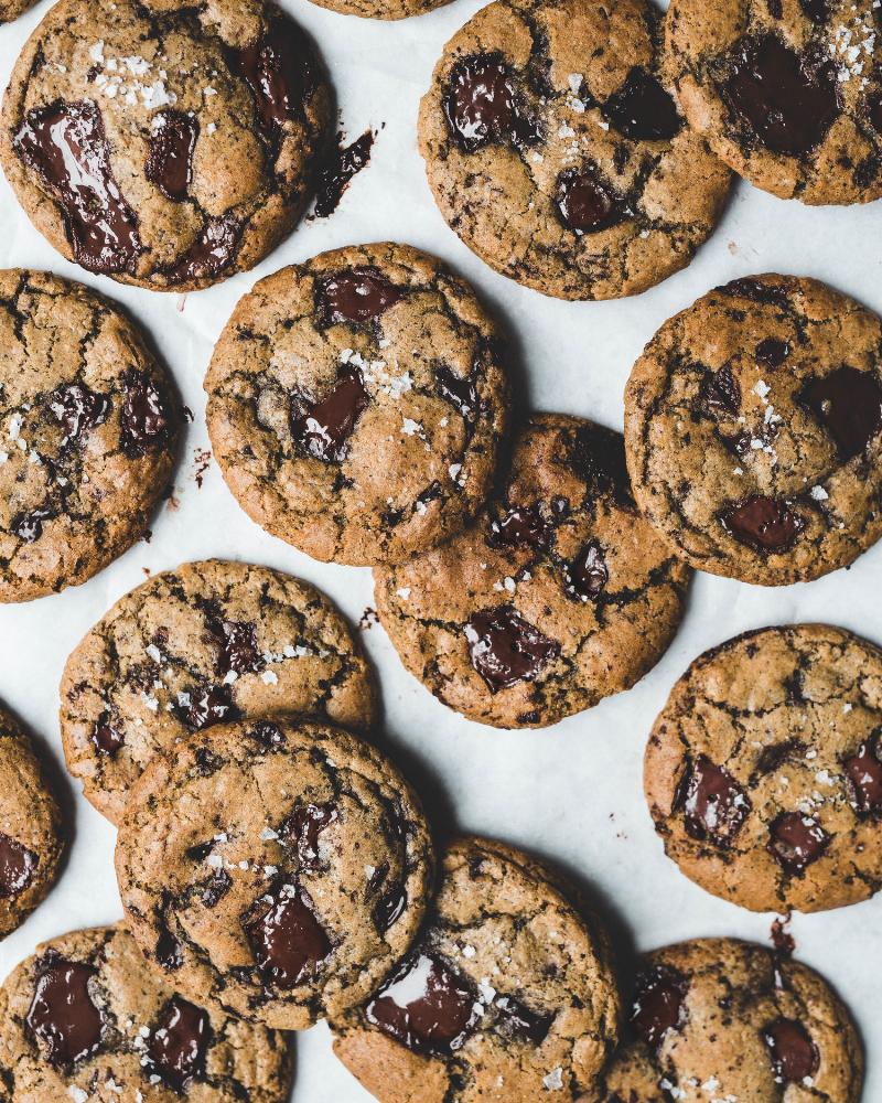 Freshly Baked Chocolate Chip Cookies Cooling on a Wire Rack