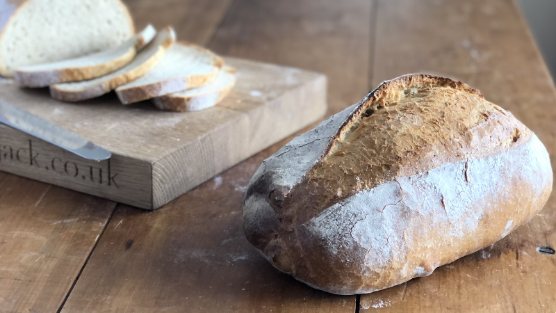 Freshly Baked Crusty Italian Bread on a Wire Rack