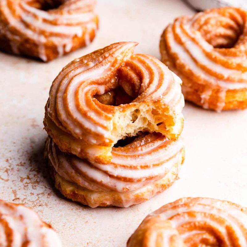 A plate of freshly baked pinwheel cookies, showcasing the perfect swirl pattern.