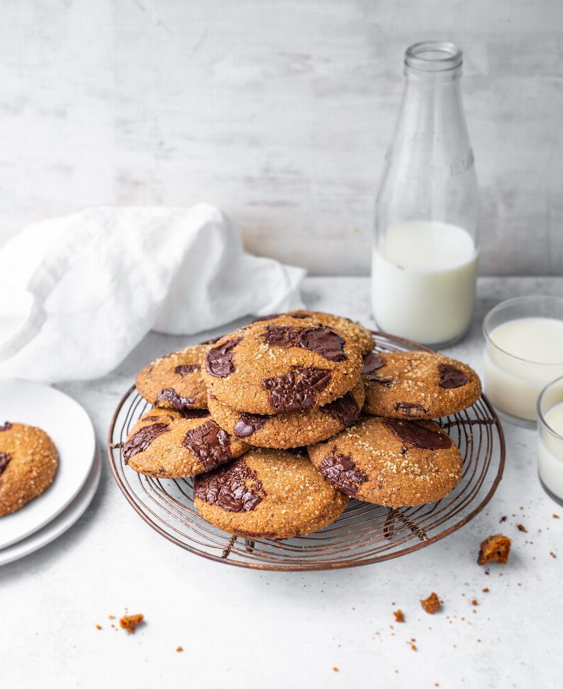 Perfectly Baked Ginger Molasses Cookies on a Baking Sheet