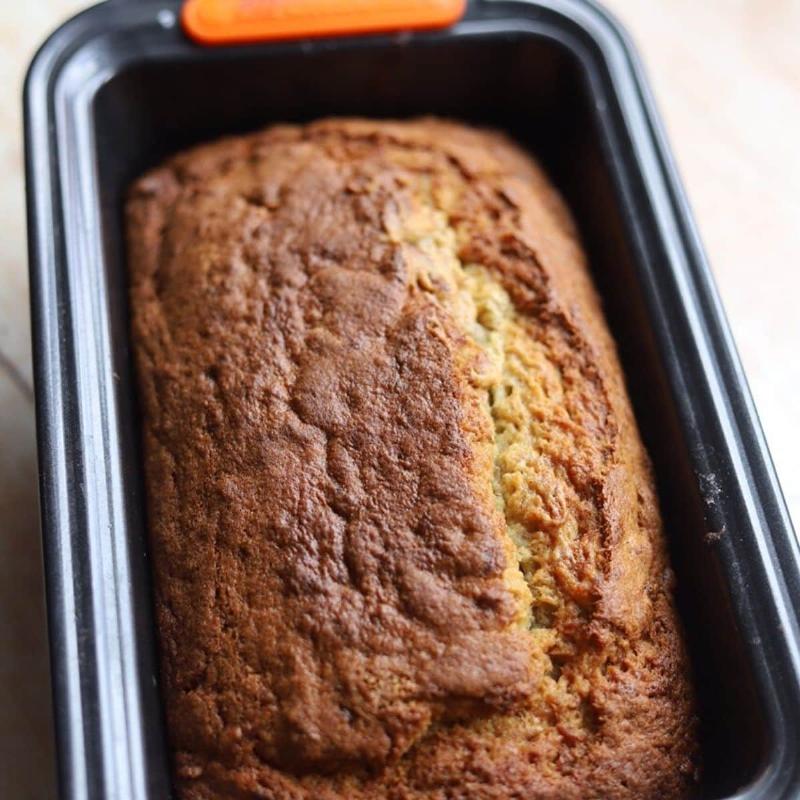 Slice of banana bread with a cup of coffee