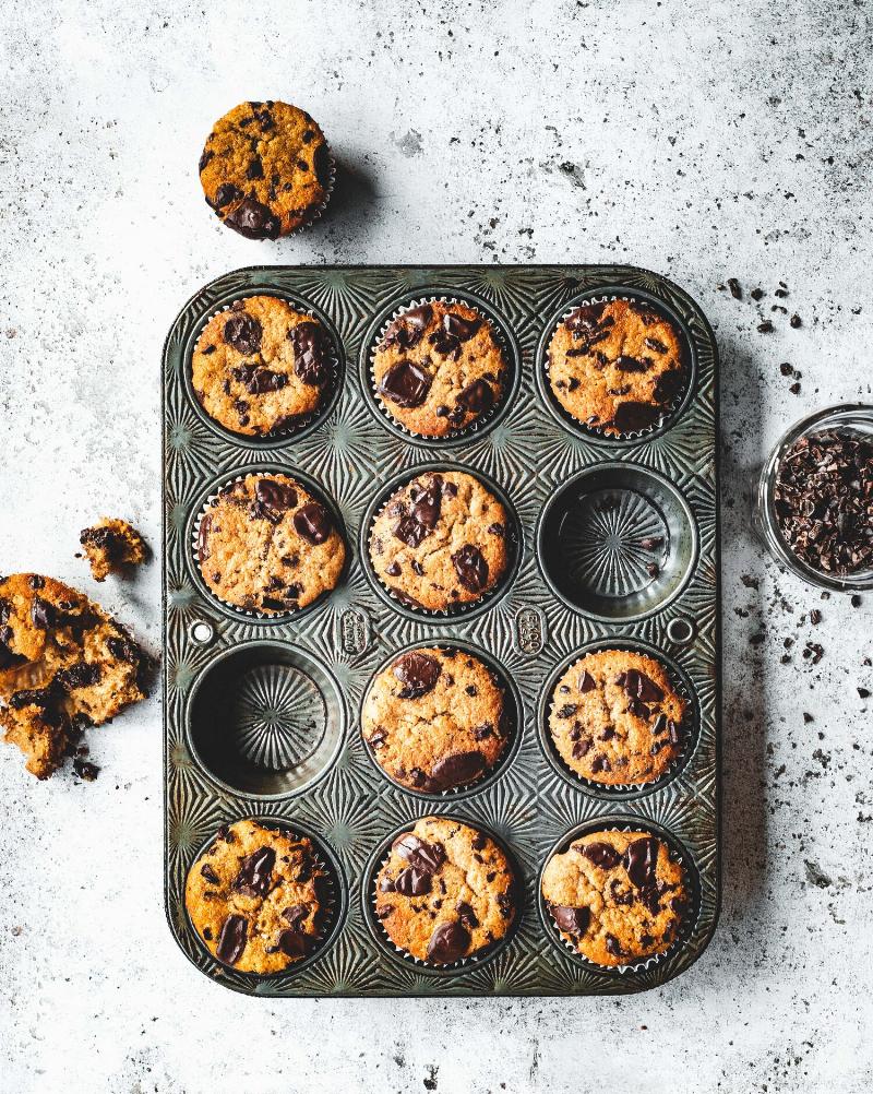 Mixing banana cupcake batter with chocolate chips