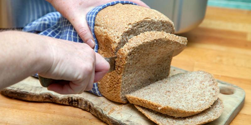 Comparing different bread storage methods: breadbox, freezer, and refrigerator.