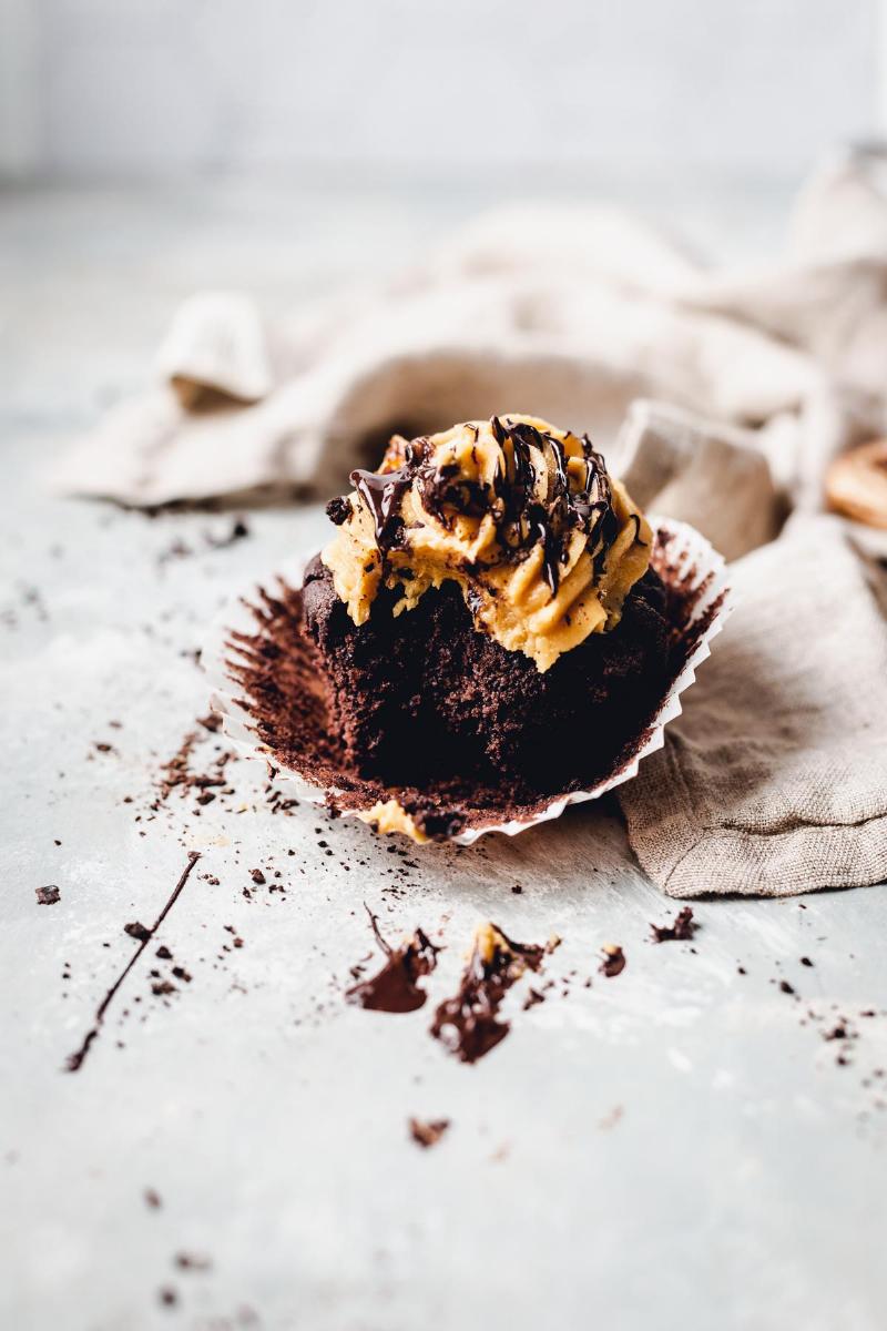 Moist Chocolate Cupcake with a Bite Taken Out