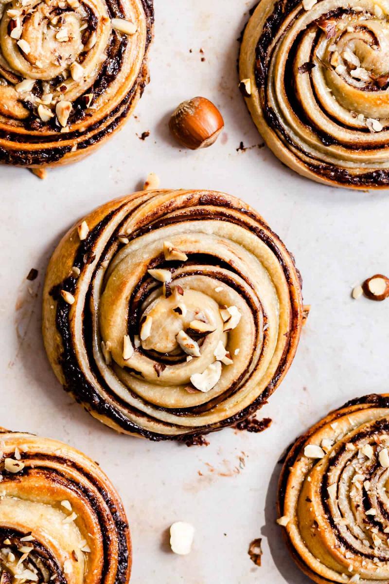 Close-up of Cinnamon-Sugar Swirl Being Spread on Vegan Dough