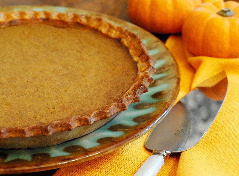 Classic Pumpkin Pie Slice on a Thanksgiving Table