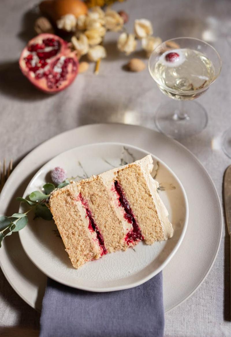 A slice of coconut cake with a fork