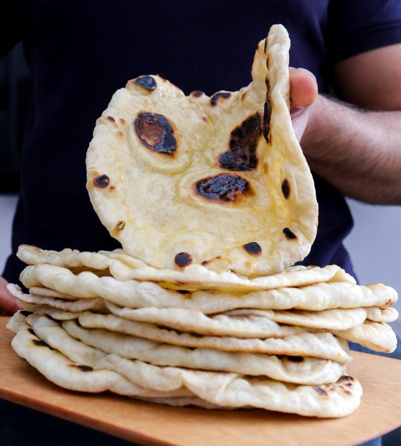 Perfectly Cooked Garlic Naan Bread with Char Marks