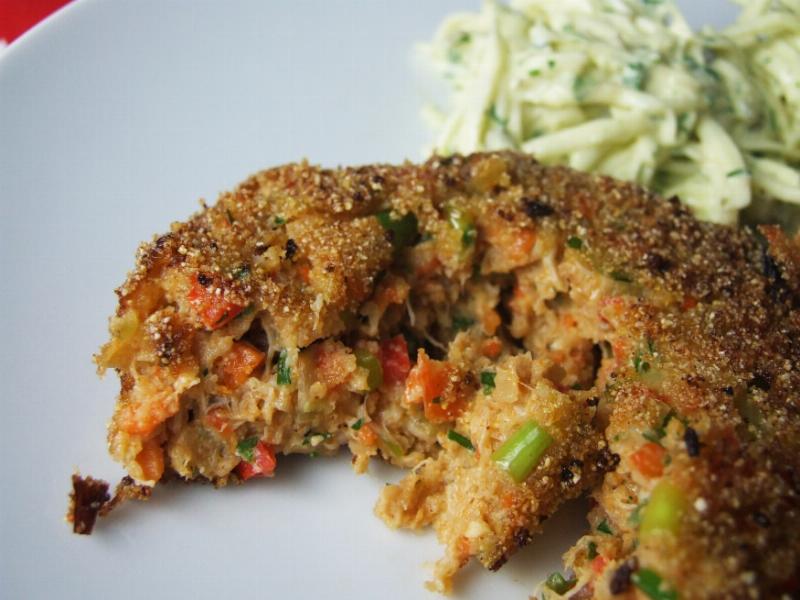 Crab Cakes Plated with Remoulade Sauce and Salad