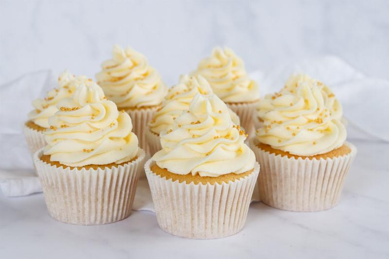 Ingredients for making a large batch of cupcakes