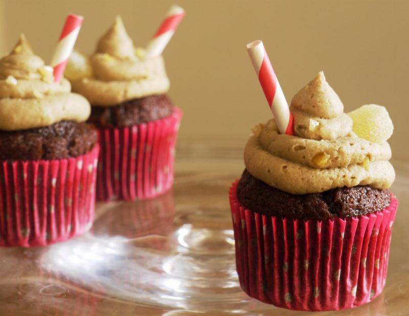 Decorated cupcakes with sprinkles and candies.