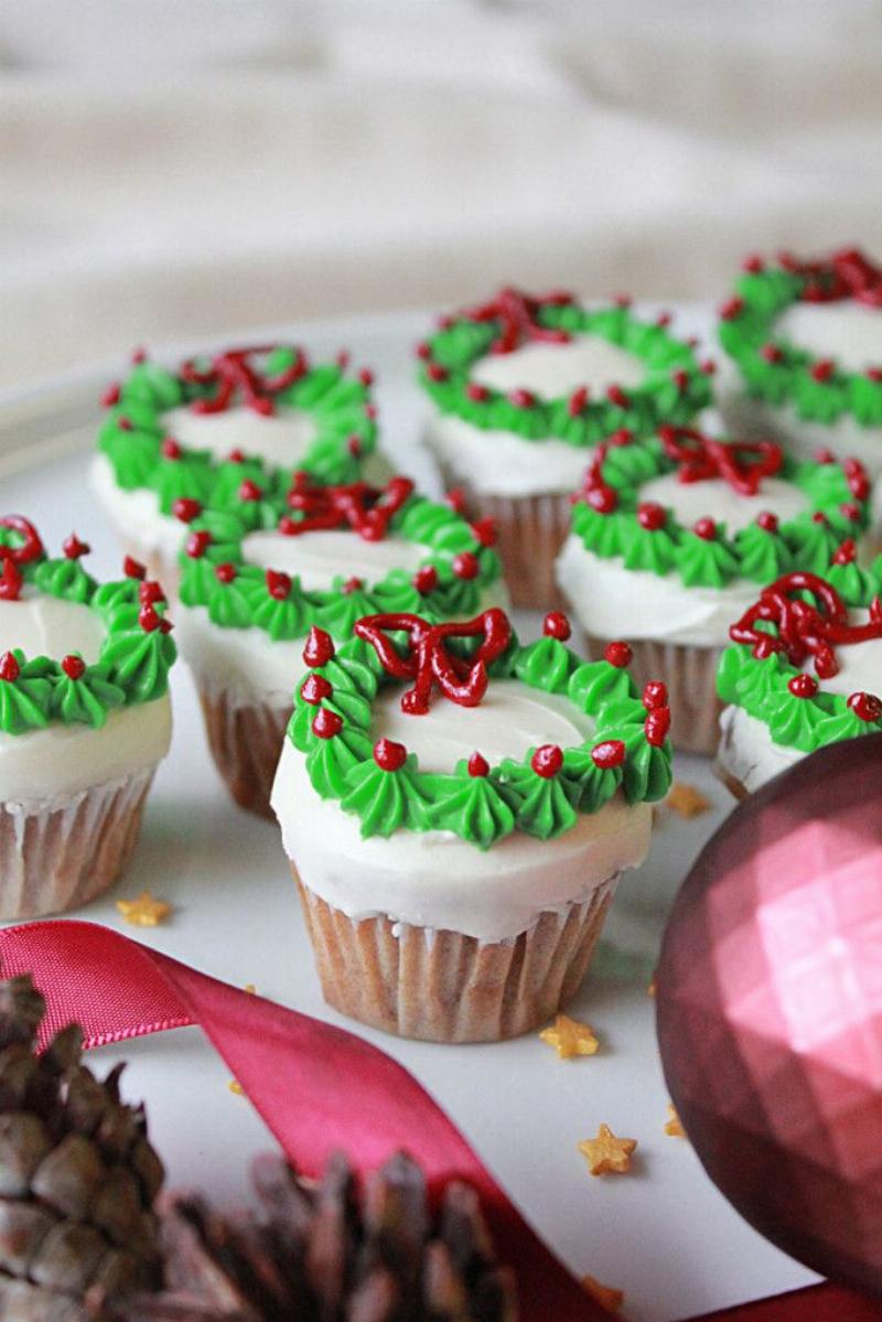 Decorating Christmas Cake with Frosting and Sprinkles