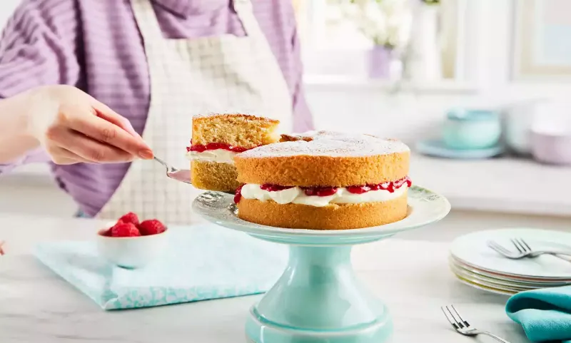 Defrosting cake layers on a wire rack in the refrigerator.