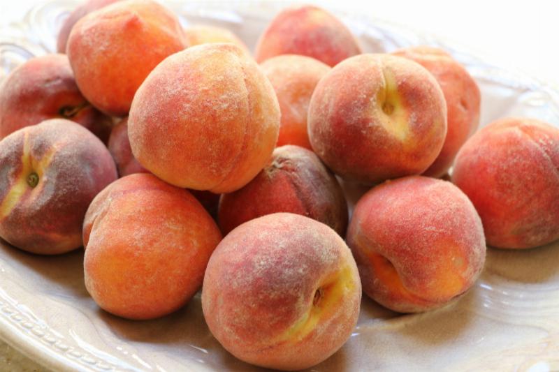 Slices of Easy Peach Cobbler Served with Vanilla Ice Cream