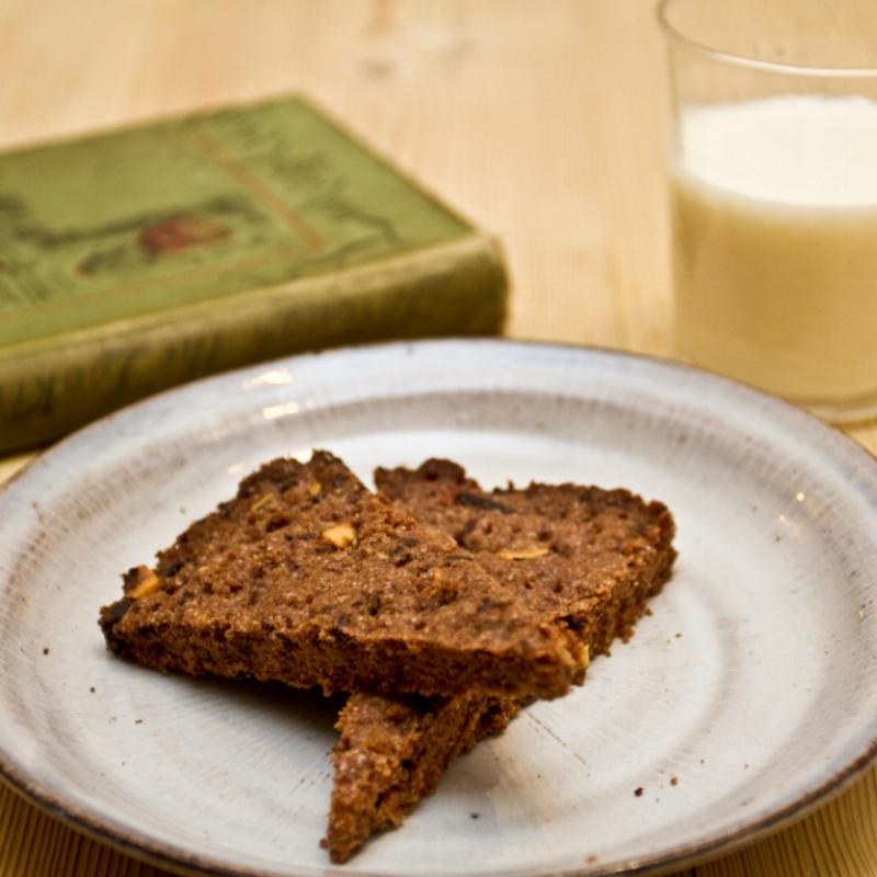 Enjoying Chocolate Hazelnut Cookies with a Glass of Milk