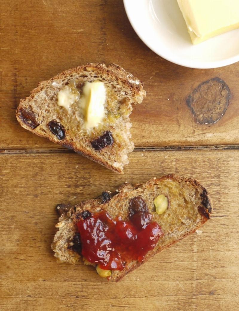 Enjoying a Slice of Homemade Raisin Bread