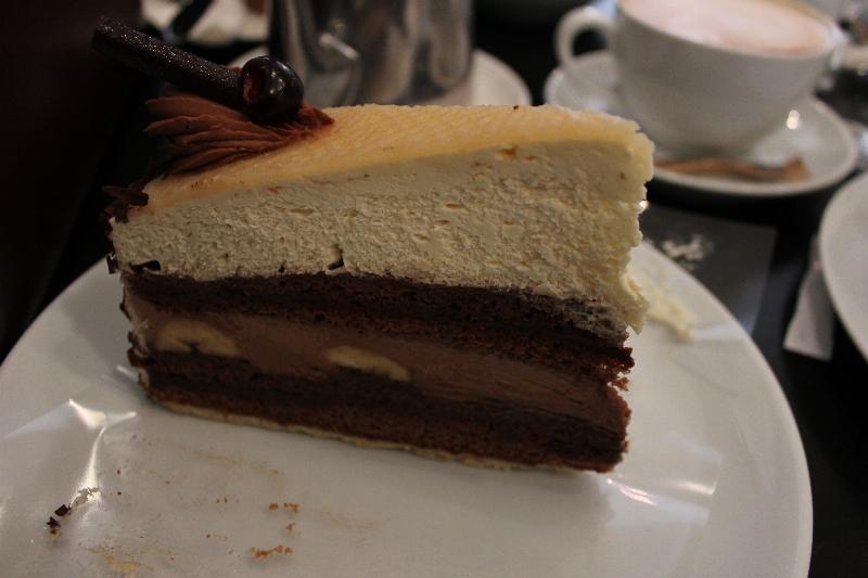 Delicious German Chocolate Cake Slice on Display at a Local Bakery