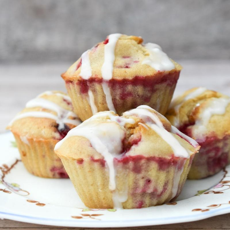 Gluten-free cherry cupcake batter being mixed in a glass bowl