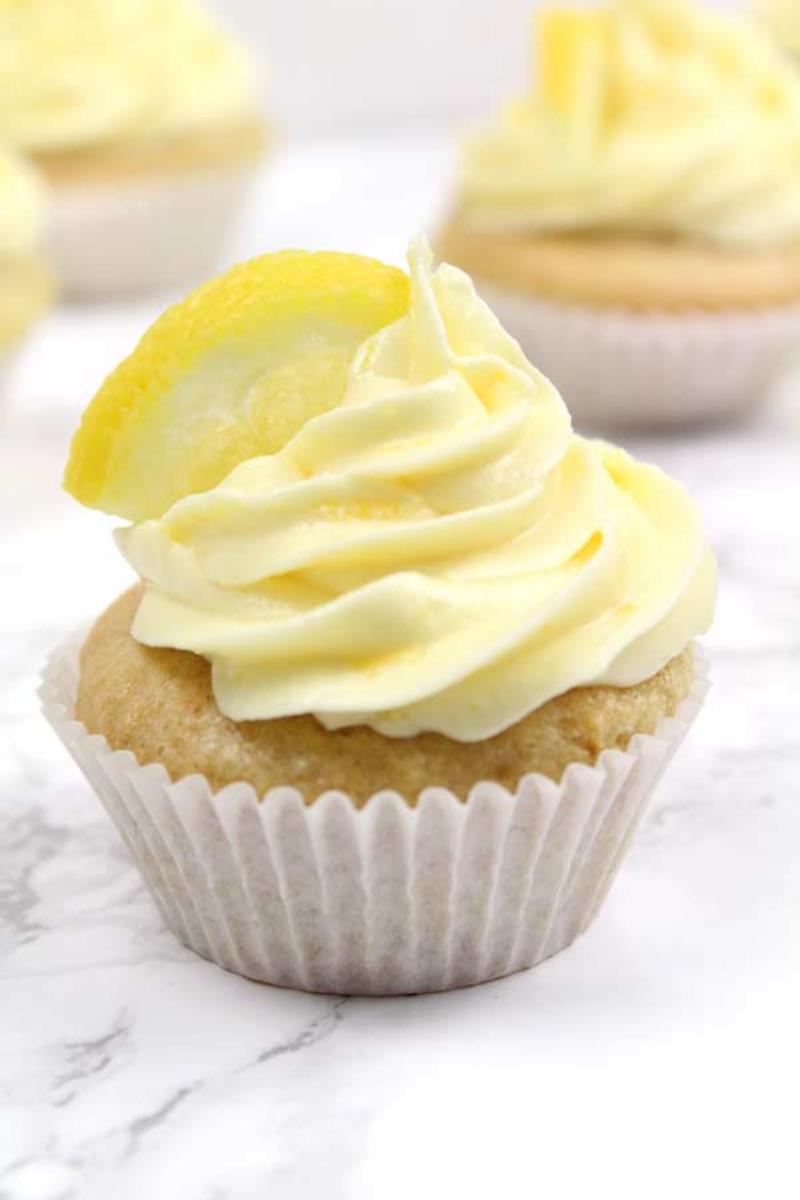 Gluten-Free Lemon Cupcakes Cooling on a Wire Rack