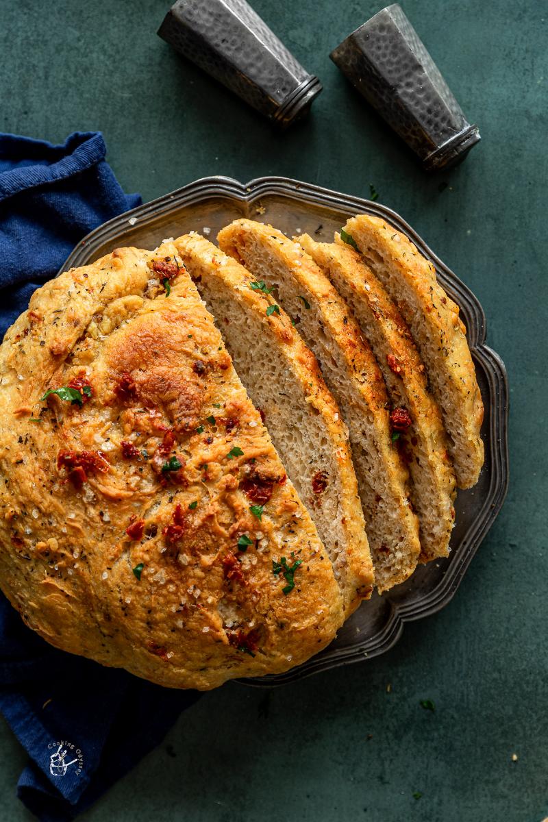 Kneading tomato bread dough