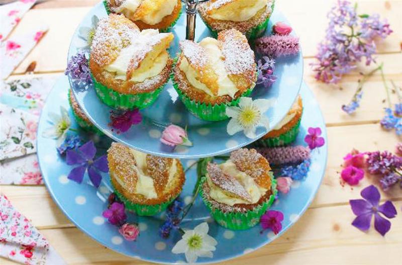 Lemon Elderflower Wedding Cake decorated with fresh flowers