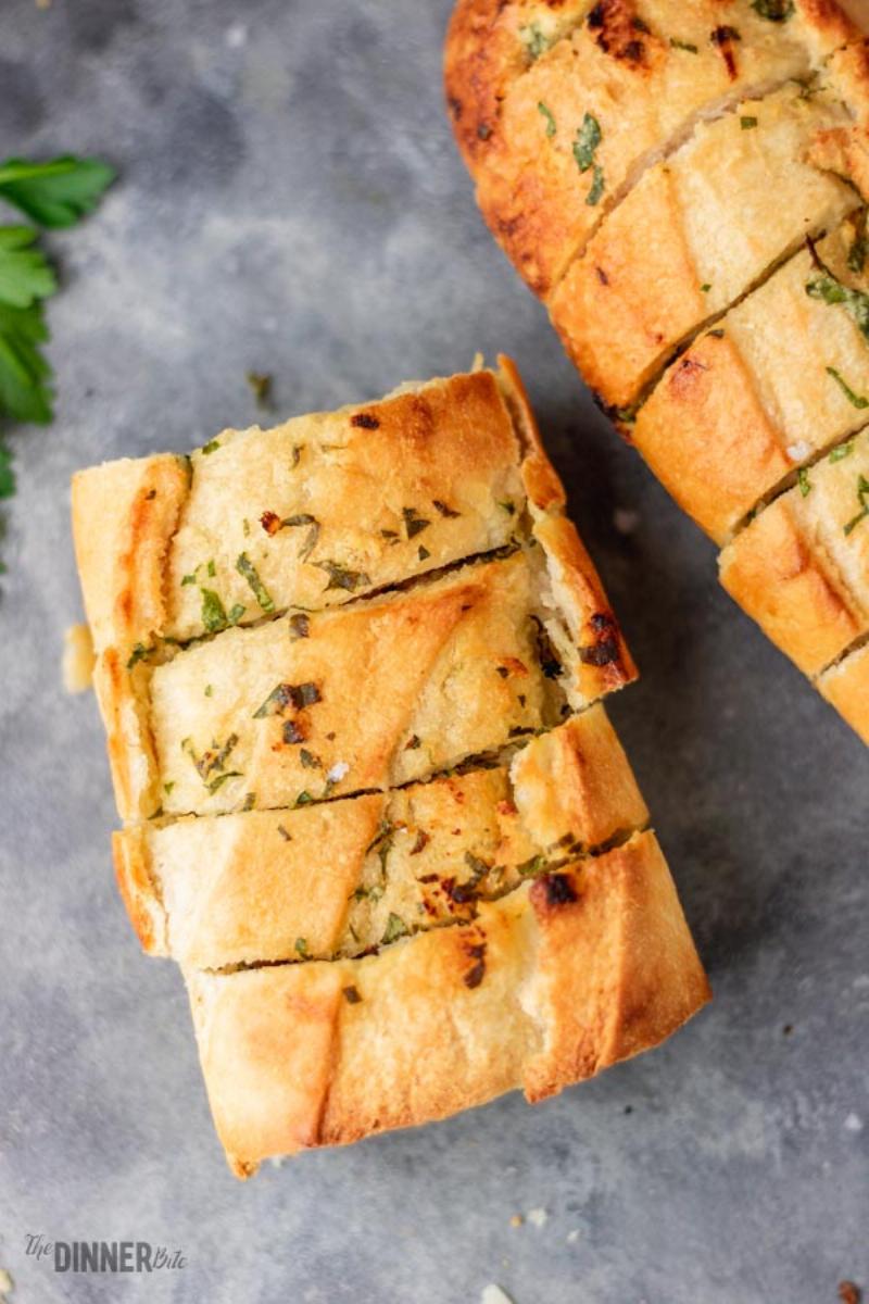 Preparing Garlic Bread Slices from Baguette