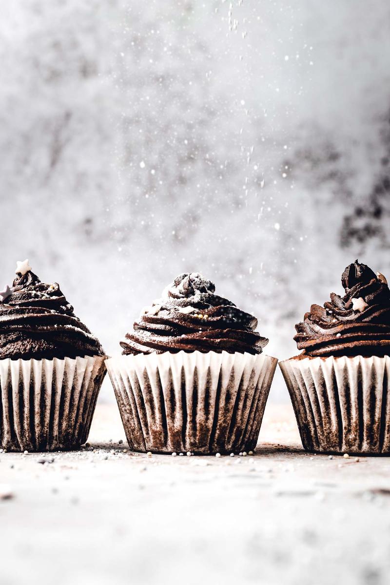 Mixing Vegan Chocolate Cupcake Batter in a Glass Bowl