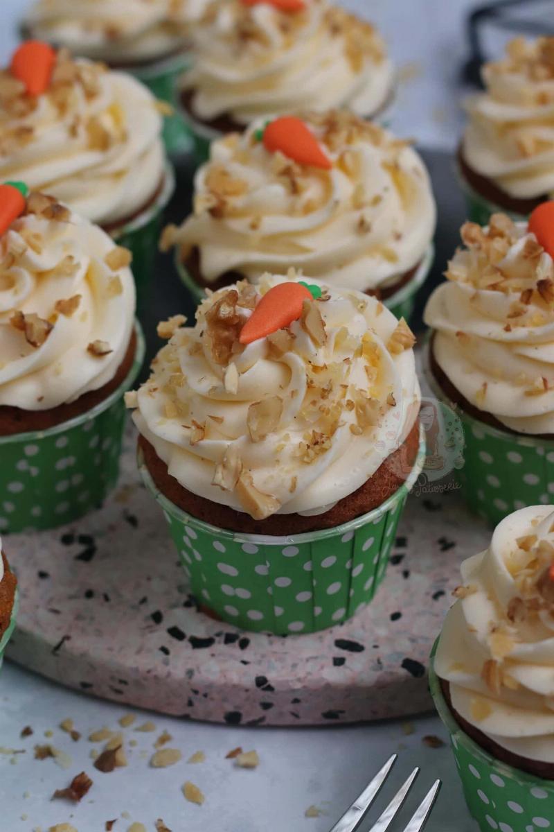 A frosted moist carrot cupcake.