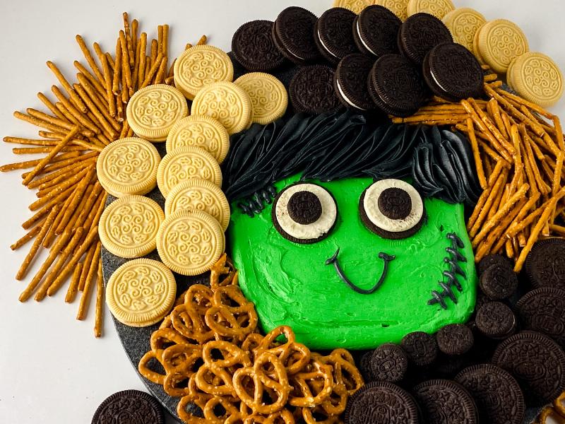 Monster Mash Halloween Cupcakes with Green Slime Frosting and Frankenstein Faces