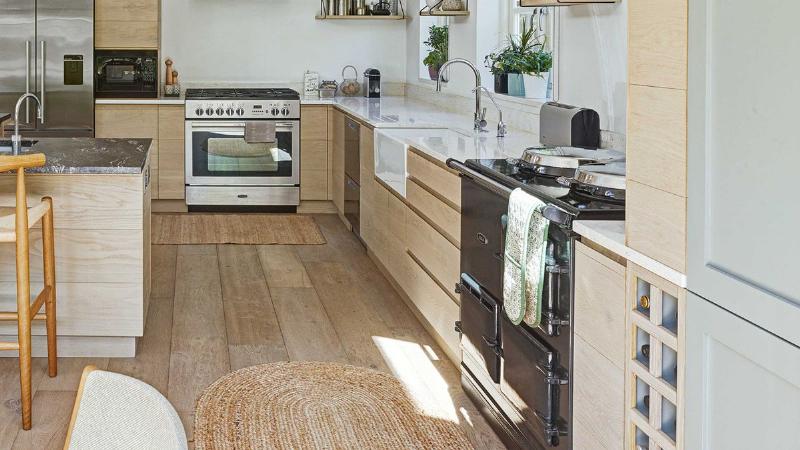 Organized baking pans in kitchen cabinet