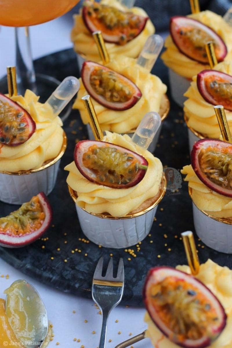 Passion fruit cupcakes baking in the oven.