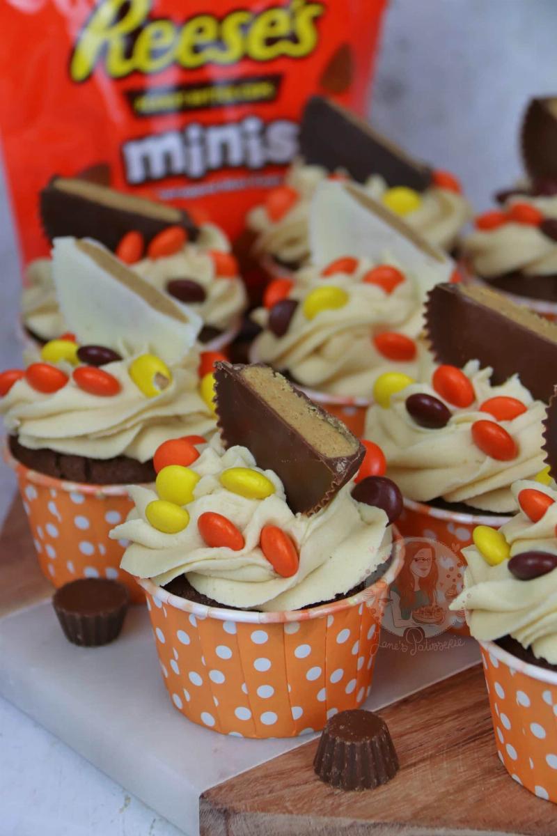 Piping Peanut Butter Frosting onto Cupcakes