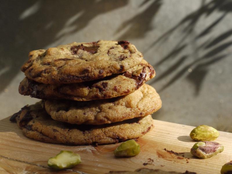 Perfectly baked pistachio cookies with vibrant green color and white chocolate chips