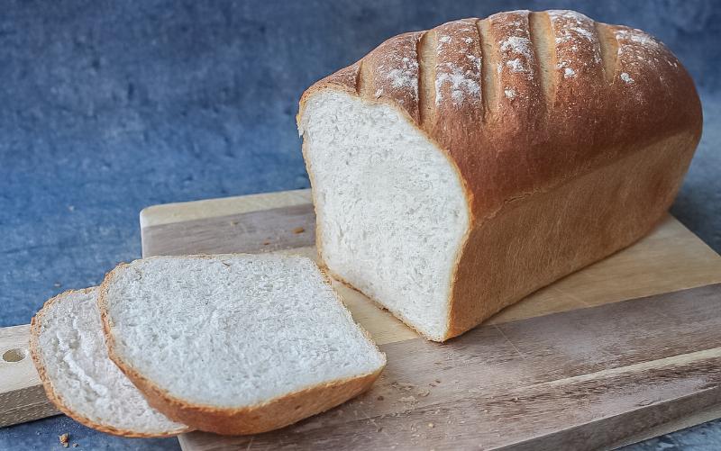 Perfectly Baked Loaf of Bread in a Loaf Pan