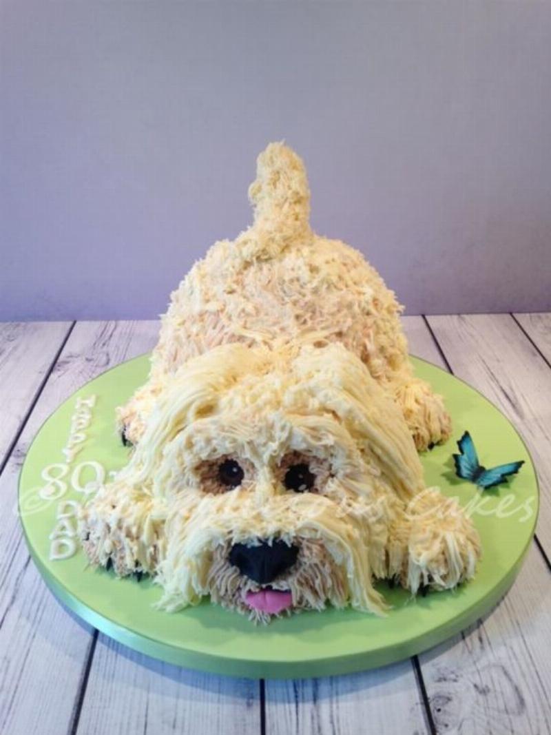 Frosting and decorating a puppy cake