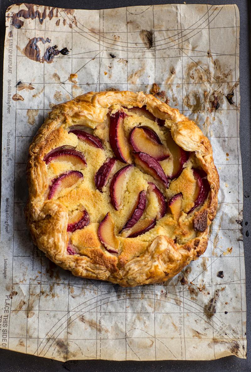 Rustic Plum Galette on a Wooden Board