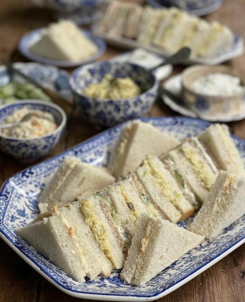 Slices of sandwich bread with various fillings