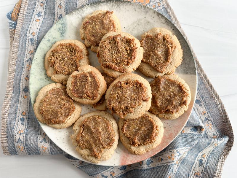 Scooping Carrot Cookie Dough onto a Baking Sheet