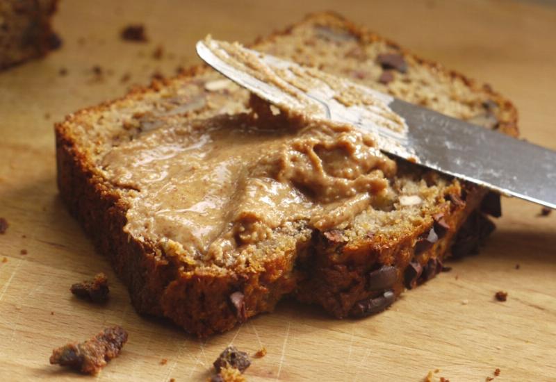 Sliced banana bread with visible chocolate chips