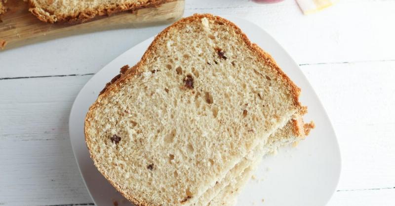 Slicing Freshly Baked Raisin Bread