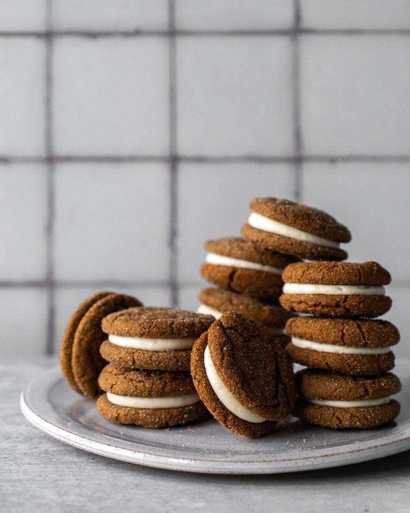 Softened butter being creamed with sugar for moist cookies