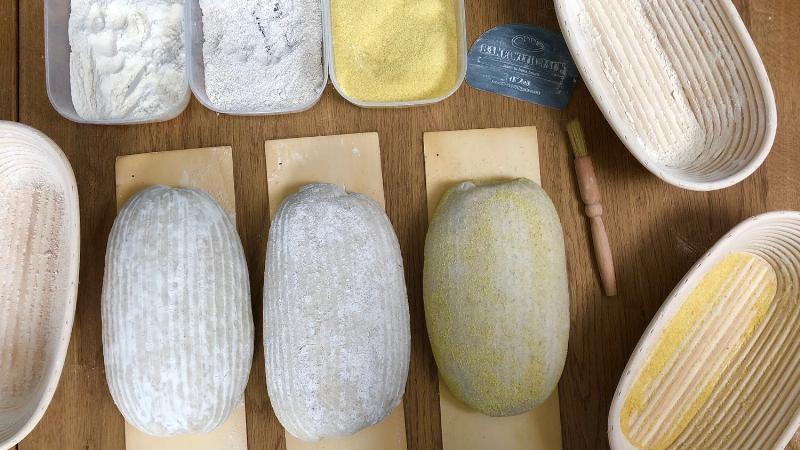 Sourdough bread dough proofing in a banneton basket