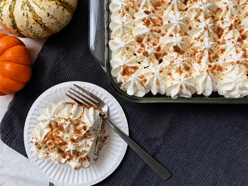 Frosting and garnishing a tres leches cake