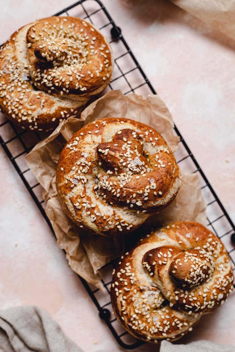 Different Types of Pretzel Breads on a Cooling Rack