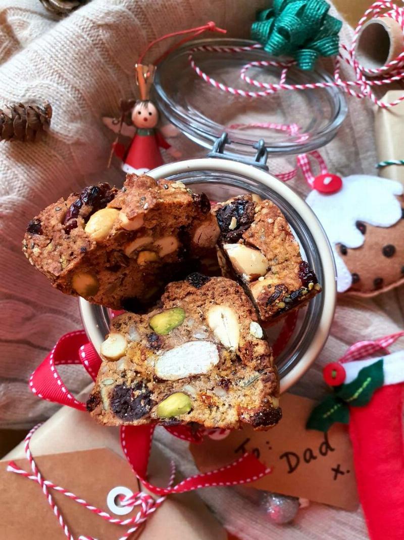 Variations of vegan almond cookies with chocolate chips and dried cranberries.