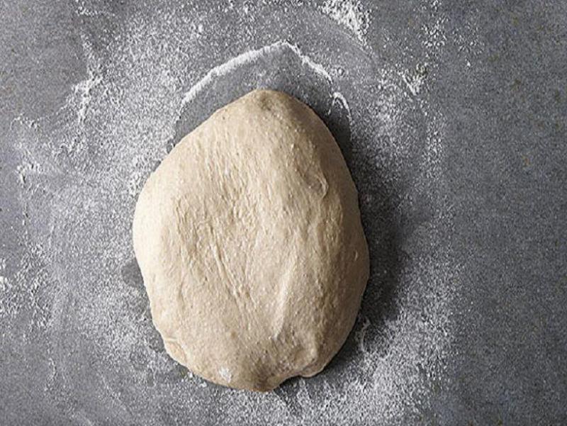 Performing the Windowpane Test on Bread Dough