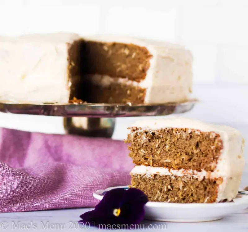 Keto Banana Cream Cheese Frosting Cake on a Cake Stand