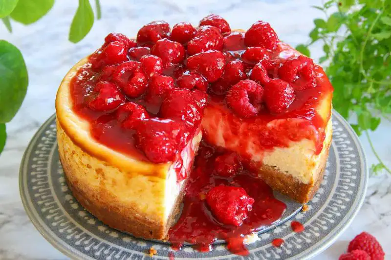 Creamy Keto Cheesecake with Cherry Topping, Sliced and Ready to Serve