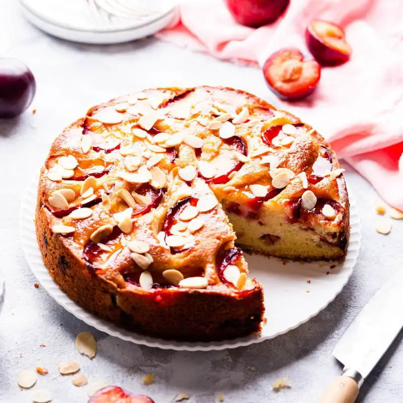 Spiced Rum Keto Pound Cake - A slice of warm, spiced pound cake garnished with a sprinkle of cinnamon.